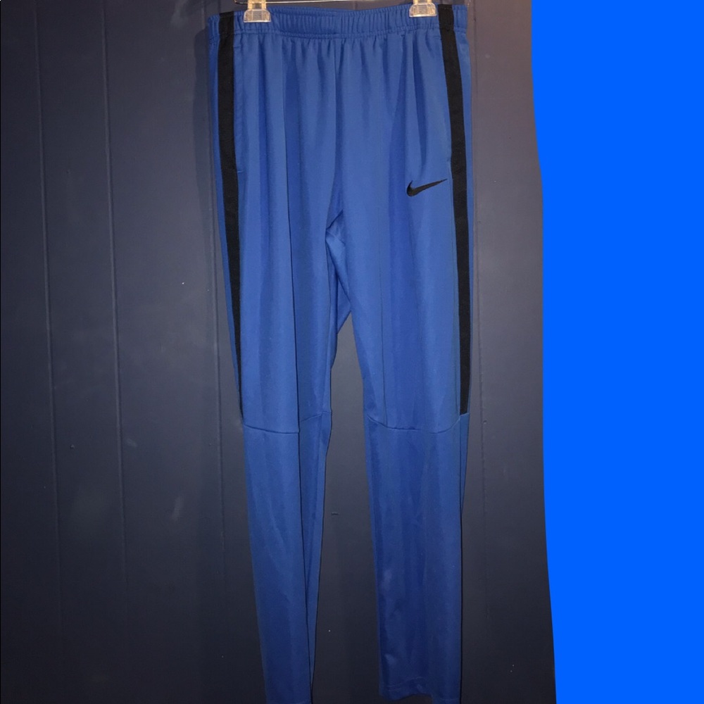Blue Nike tapered athletic pants